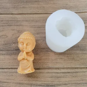 Vista detallada del molde de silicona con forma de Buda para velas