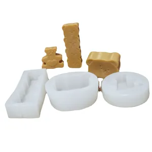 Set of cute bear silicone molds for candles and chocolate mousse tools on white background