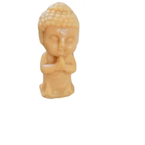 Pequeña vela aromática de Buda sentado con manos en oración