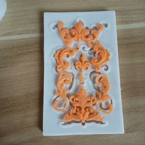 Detailed view of intricate European relief totem patterns on a silicone fondant mold.