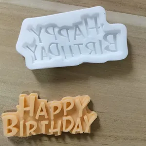 Silicone mold for Happy Birthday cake toppers showing the mold and finished fondant piece
