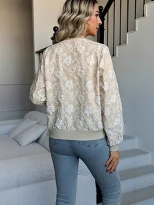 Elegante giacca bomber beige con texture floreale per donna con polsini e orlo a costine
