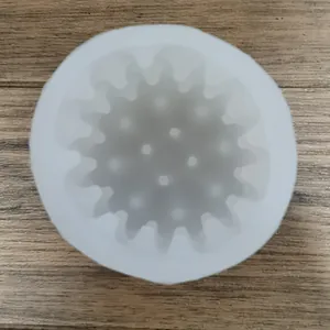 Detailed interior view of a honeycomb cylindrical silicone mold for DIY candle making