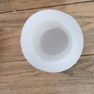 Macro top-down view of a cylindrical white silicone mold for candle or plaster craft making
