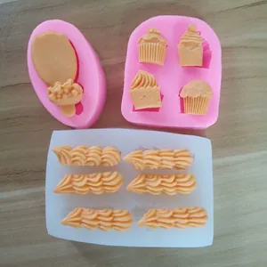 Macro detail view of various silicone molds for ice cream and cupcake shaped cake decorations