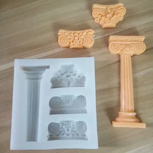 Detalle del molde de silicona de columna romana con muestras terminadas de color melocotón