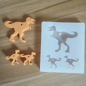 Vue détaillée du moule en silicone pour porte-clés dinosaure avec pendentifs