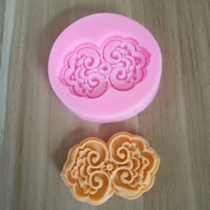 Stampo in silicone con motivo a nuvola cinese tradizionale e pezzo in fondente finito