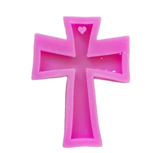 Pink cross-shaped silicone mold for keychain resin or fondant crafting