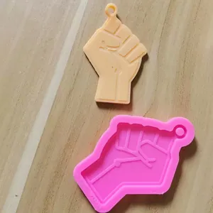 Detailed clenched fist silicone mold for DIY keychains and car aromatherapy pendants