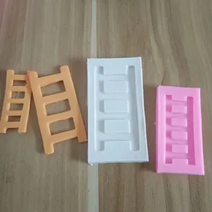 Detail view of ladder-shaped silicone molds for fondant and chocolate decoration