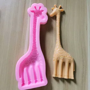 Detailed macro shot of giraffe silicone mold and finished chocolate fondant decoration