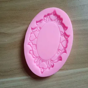 Macro detail of a pink vintage heart frame silicone mold for DIY baking and crafts.