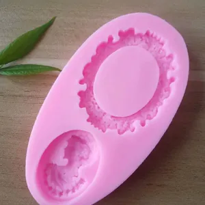 Detail view of pink silicone mold featuring retro photo frame and cameo lady designs