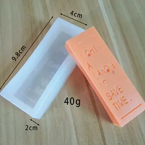 Close-up view of rectangular silicone mold for handmade soap and candles with dimensions
