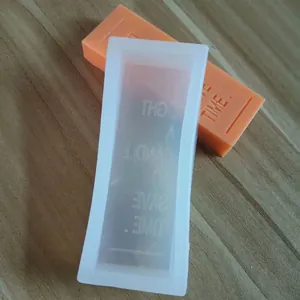 Detailed view of the rectangular silicone mold and finished bar with Save Time text
