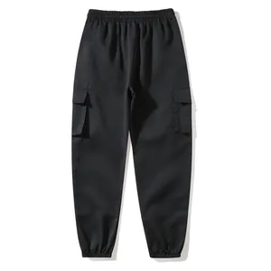High-quality close-up of black cargo joggers with side pockets and elasticated cuffs