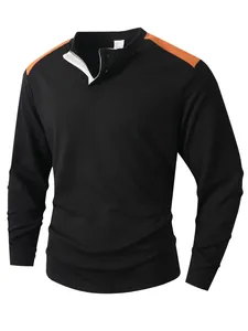 Detailansicht des schwarzen Waffelstrick-Henley-Shirts für Herren mit orangen Akzenten