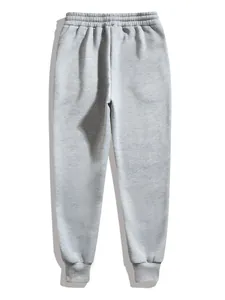 Vista posteriore dettagliata di pantaloni sportivi grigi a tinta unita con elastico