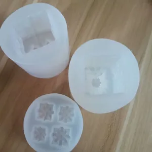 Detailed macro view of semi-transparent 3D gift box silicone molds for cake decorating
