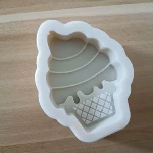 Macro view of white silicone ice cream shaped mold for creative cake decoration and baking