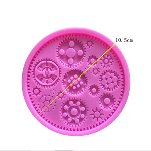 Stampo in silicone rosa da 10,5 cm con vari motivi di ingranaggi steampunk per fondente