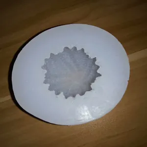 Detailed interior view of a 3D yarn ball silicone mold for candle and plaster making.