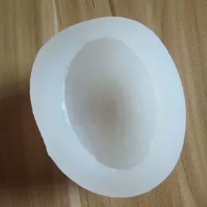 Close-up of translucent white silicone mold for 3D stone-shaped crafts