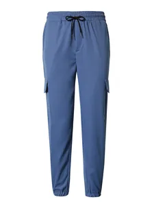 Detailed view of men's blue multi-pocket cargo pants with elastic drawstring waist