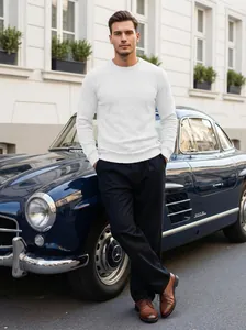 Premium men's white jacquard long-sleeve sweatshirt styled in a luxury outdoor setting.