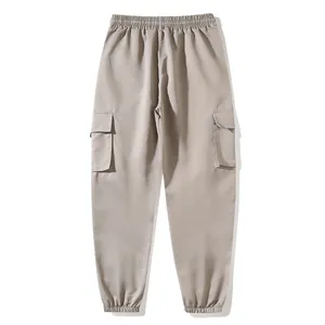 Back view of high-quality khaki cargo jogger pants featuring an elastic waist and side pockets