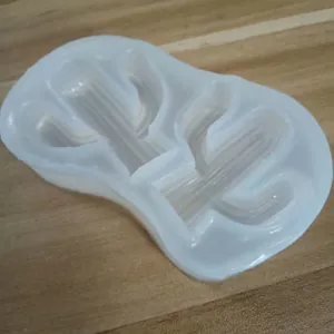 Detail view of 2-cavity cactus silicone mold for fondant and chocolate DIY baking.