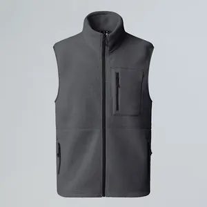 Front view of a charcoal grey fleece vest with stand collar and zippered chest pocket