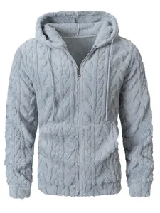 Detailweergave van grijze getextureerde fleece hoodie met capuchon en ritssluiting