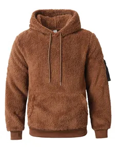 Close-up view of a brown men's fuzzy fleece hoodie with drawstring and pocket