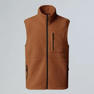 Detailed view of brown fleece outdoor vest featuring a stand collar and zippered pockets