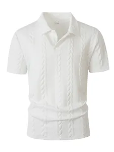 Detail of white men's cable knit polo shirt with intricate honeycomb jacquard texture.
