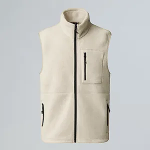 Front view of off-white fleece vest with black zipper details and a chest pocket