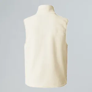 Detailed back view of a minimalist cream fleece outdoor vest with a stand collar