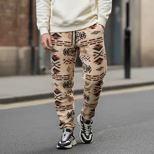 Detail shot of the ethnic geometric pattern and drawstring on warm fleece joggers