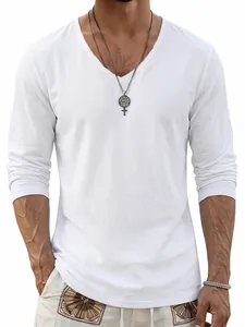 Detail shot of white linen V-neck long sleeve shirt showing fabric texture and casual fit