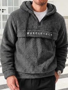 Men's premium dark grey plush fleece hoodie with white embroidered MUSCLETACK lettering