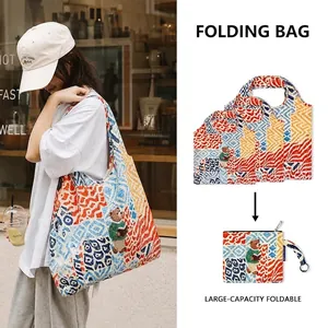 Large capacity foldable shopping bag with colorful geometric bear pattern design