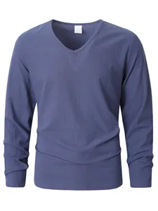 Detail view of a men's blue breathable linen V-neck long-sleeve casual shirt.