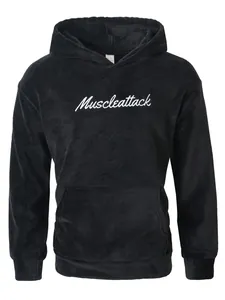 Close-up detail of soft black plush hoodie featuring white Muscleattack cursive embroidery