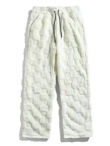 Close-up detail of white fuzzy shaggy checkerboard pattern straight-leg casual pants
