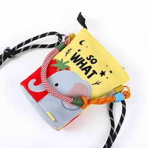 Close-up detail of canvas bucket bag featuring a cute cartoon elephant print and SO WHAT text