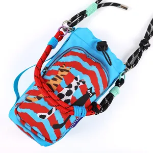 Close-up detail of vibrant blue dopamine style crossbody phone bag with cartoon cat prints