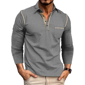 Détail du polo gris à manches longues pour homme avec coutures contrastées et poche