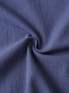 Macro detail of breathable purple linen fabric texture for men's casual shirt
